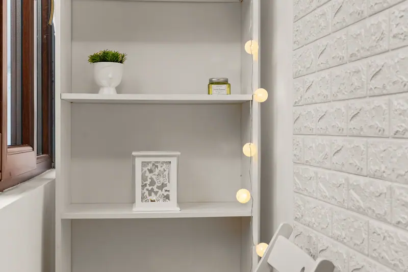 Apartament cu bibliotecă și canapea cărămizie, Piața Kogălniceanu, București, fotografia 17