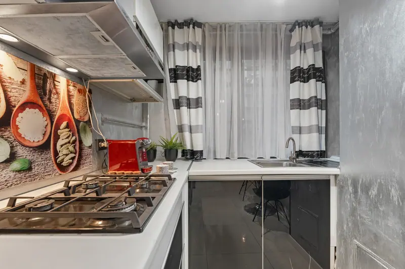 Apartament cu tapet texturat și bucătărie lucioasă, București, fotografia 16